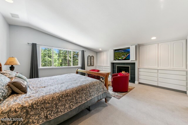1064 Lucerne Way, Incline Village, NV 89451 - bedroom featuring vaulted ceiling, light carpet, recessed lighting, and a fireplace