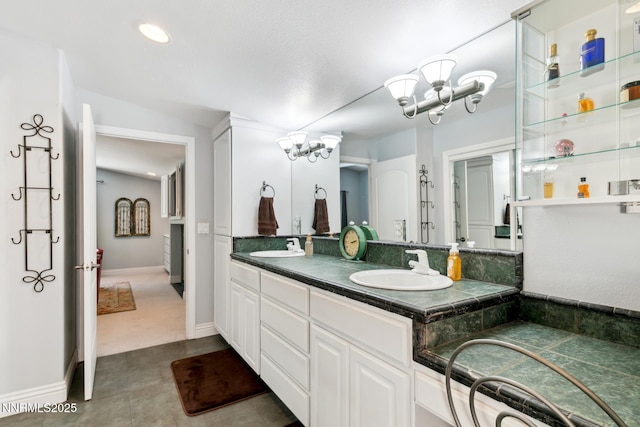 1064 Lucerne Way, Incline Village, NV 89451 - bathroom featuring double vanity, a chandelier, and recessed lighting
