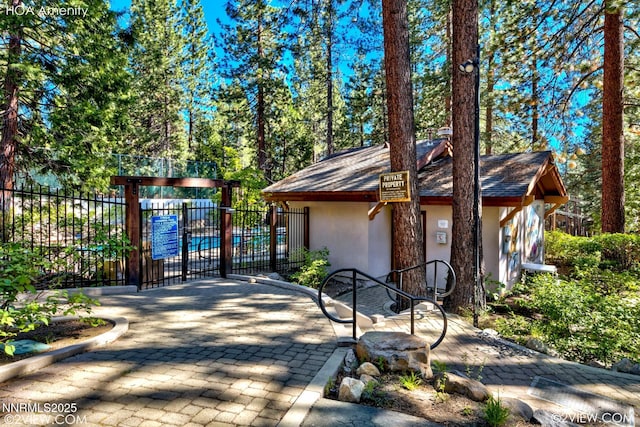 1064 Lucerne Way, Incline Village, NV 89451 - view of front of home featuring stucco siding and a shingled roof