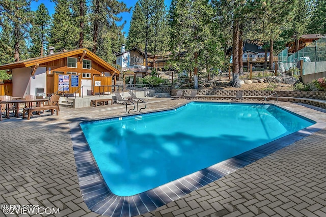 1064 Lucerne Way, Incline Village, NV 89451 - community pool featuring a patio area and an outdoor structure
