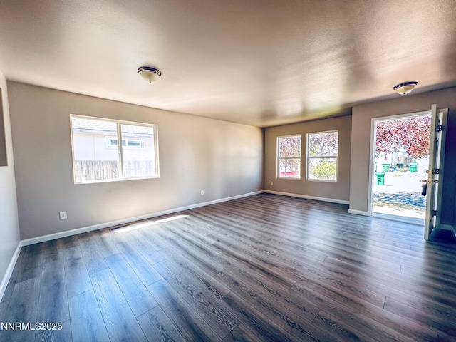 7420 Findhorn Dr, Reno, NV 89506 - spare room with dark wood-style flooring and baseboards