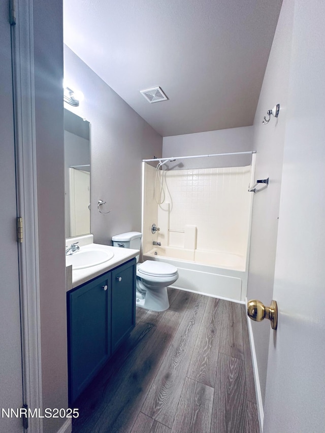 7420 Findhorn Dr, Reno, NV 89506 - bathroom featuring wood finished floors, tub / shower combination, and vanity
