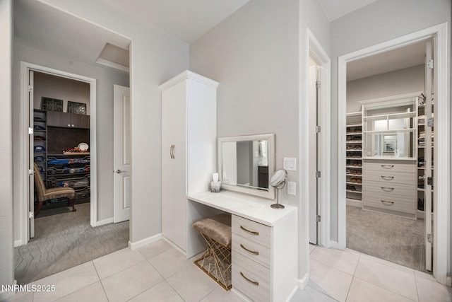 2021 Neviekay Ln, Reno, NV 89521 - bathroom featuring a spacious closet, tile patterned floors, and vanity