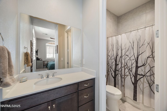 2021 Neviekay Ln, Reno, NV 89521 - ensuite bathroom with vanity and tile patterned floors