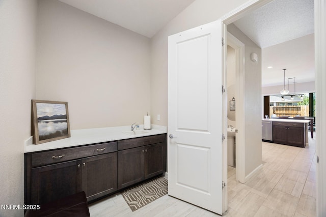 2021 Neviekay Ln, Reno, NV 89521 - bar featuring dishwasher and vaulted ceiling
