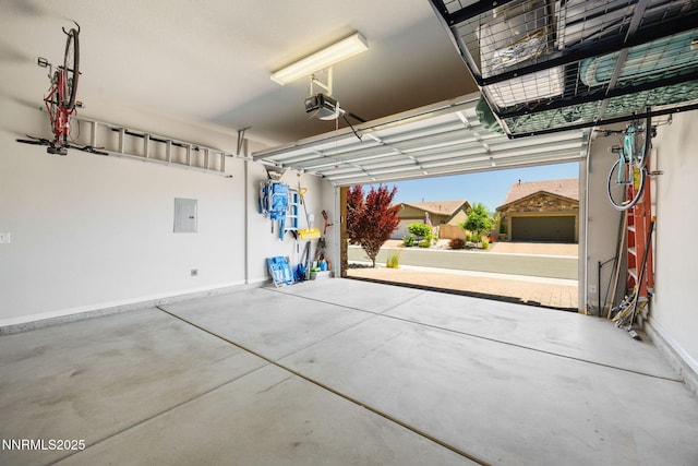2021 Neviekay Ln, Reno, NV 89521 - garage with a garage door opener and electric panel