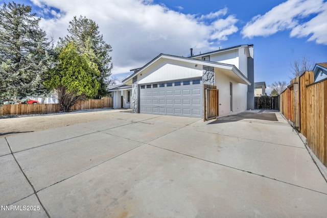 4565 Rio Encantado Ln, Reno, NV 89502 - view of front of home with driveway and an attached garage