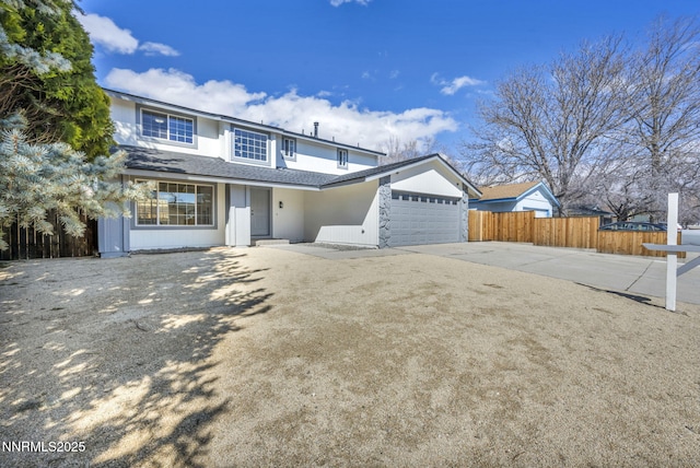 4565 Rio Encantado Ln, Reno, NV 89502 - traditional-style house featuring concrete driveway, roof with shingles, and an attached garage