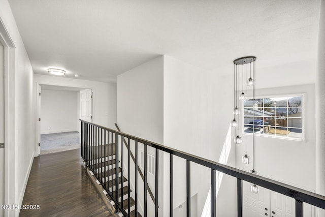 4565 Rio Encantado Ln, Reno, NV 89502 - hall featuring an upstairs landing and dark wood-style flooring