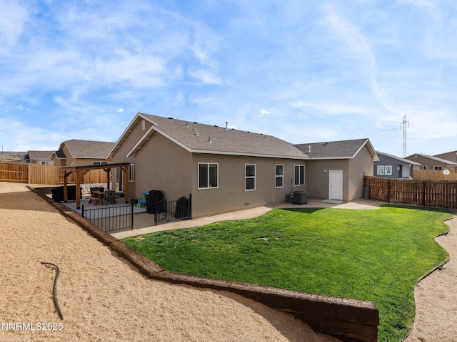 1332 Serenity Cir, Fernley, NV 89408 - back of property with a patio, stucco siding, and a fenced backyard