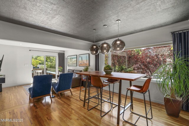 1296 Nixon Ave, Reno, NV 89509 - dining area featuring wood finished floors and baseboards
