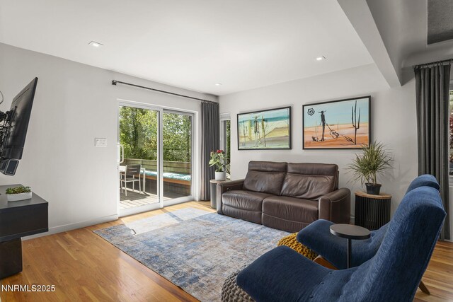 1296 Nixon Ave, Reno, NV 89509 - living area with wood finished floors and recessed lighting