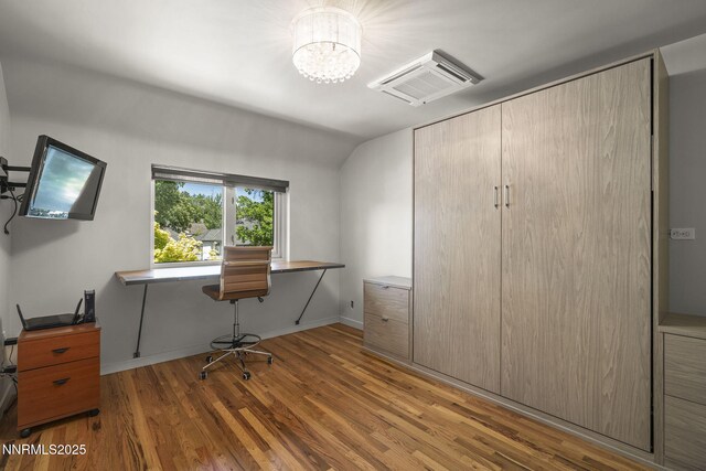 1296 Nixon Ave, Reno, NV 89509 - office with wood finished floors, a chandelier, and vaulted ceiling
