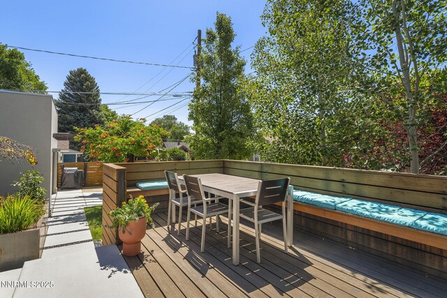 1296 Nixon Ave, Reno, NV 89509 - wooden terrace with outdoor dining area and a covered hot tub