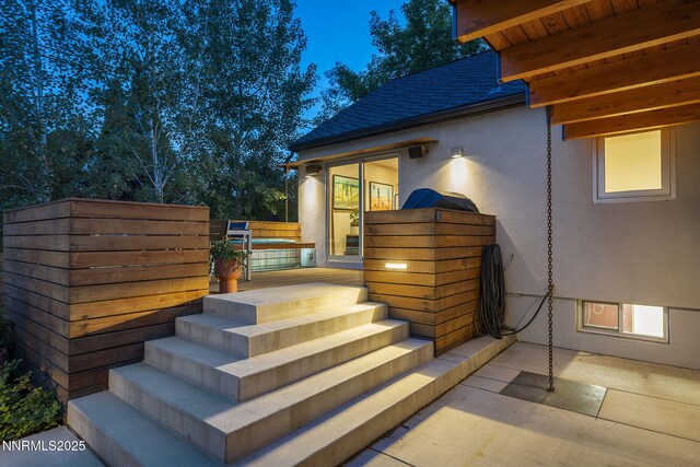 1296 Nixon Ave, Reno, NV 89509 - property entrance with stucco siding and a shingled roof
