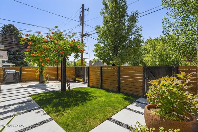 1296 Nixon Ave, Reno, NV 89509 - view of yard with a patio area and a gate