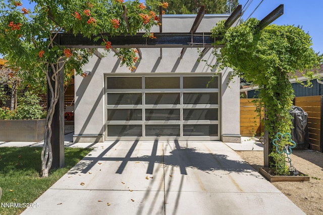 1296 Nixon Ave, Reno, NV 89509 - view of front facade with driveway, a garage, and stucco siding