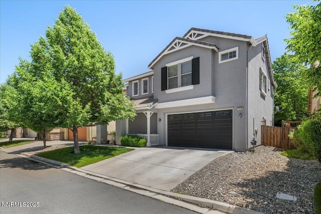 7470 Windswept Loop, Sparks, NV 89436 - view of front of house featuring an attached garage, driveway, and stucco siding