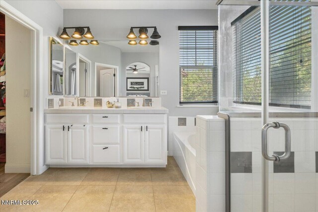7470 Windswept Loop, Sparks, NV 89436 - full bath featuring double vanity, a bath, a shower stall, and tile patterned floors