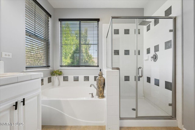7470 Windswept Loop, Sparks, NV 89436 - bathroom with a garden tub, vanity, and a shower stall
