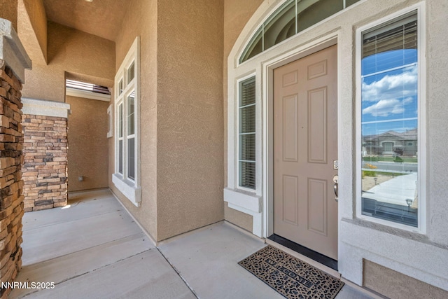 11575 Anthem Dr, Spanish Springs, NV 89441 - doorway to property with stucco siding