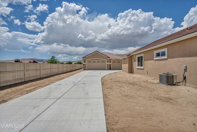 11575 Anthem Dr, Spanish Springs, NV 89441 - view of yard with concrete driveway and an attached garage
