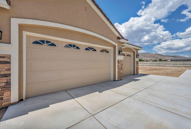 11575 Anthem Dr, Spanish Springs, NV 89441 - garage featuring a mountain view