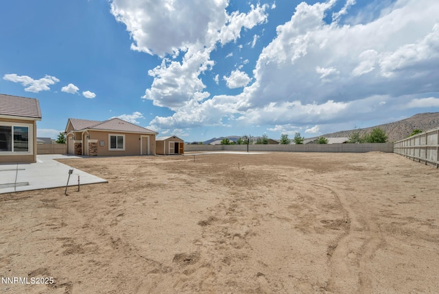 11575 Anthem Dr, Spanish Springs, NV 89441 - view of yard with a patio and an outdoor structure