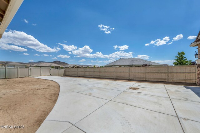 11575 Anthem Dr, Spanish Springs, NV 89441 - fenced backyard featuring a patio area