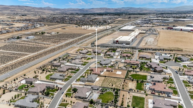 11575 Anthem Dr, Spanish Springs, NV 89441 - aerial perspective of suburban area featuring a mountain backdrop