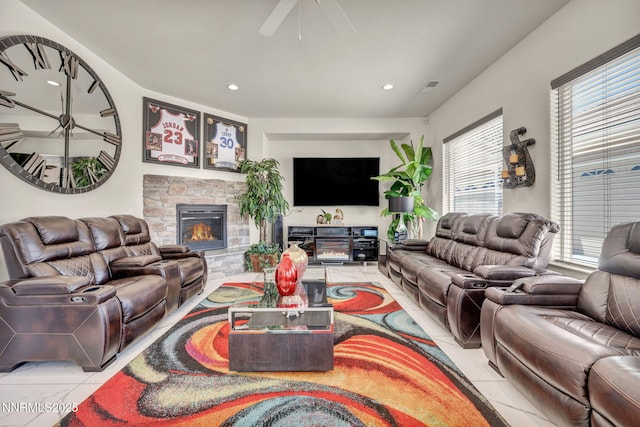 11575 Anthem Dr, Spanish Springs, NV 89441 - living area with healthy amount of natural light, recessed lighting, a fireplace, a ceiling fan, and tile patterned floors