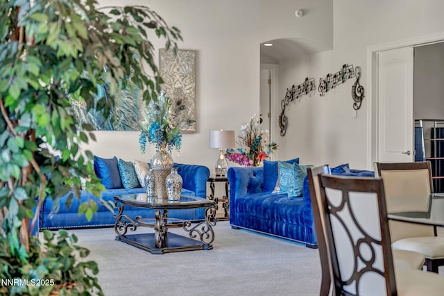11575 Anthem Dr, Spanish Springs, NV 89441 - living area with carpet floors and arched walkways