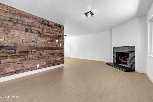 1125 Vance Way, Sparks, NV 89431 - unfurnished living room with a tiled fireplace and wood finished floors
