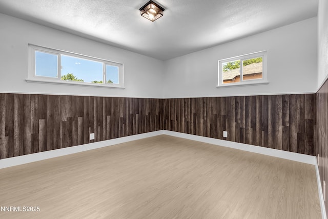 1125 Vance Way, Sparks, NV 89431 - spare room featuring wood finished floors and a textured ceiling
