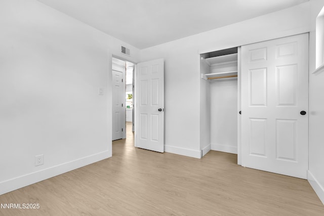 1125 Vance Way, Sparks, NV 89431 - unfurnished bedroom featuring light wood-type flooring and a closet