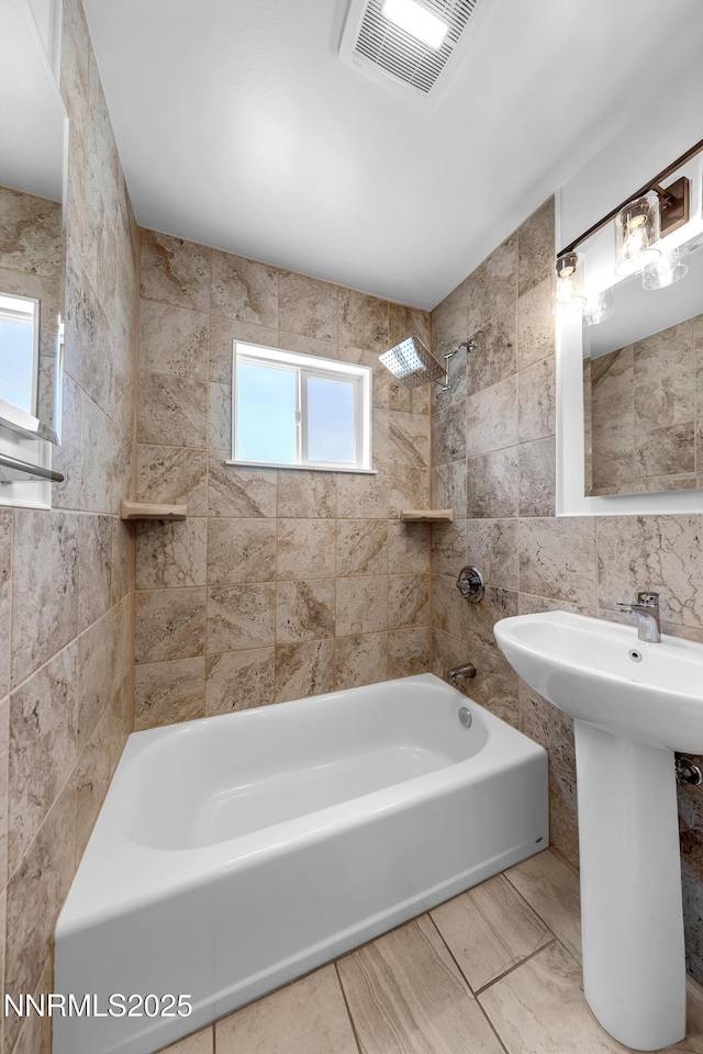1125 Vance Way, Sparks, NV 89431 - bathroom with tile walls, shower / washtub combination, and plenty of natural light