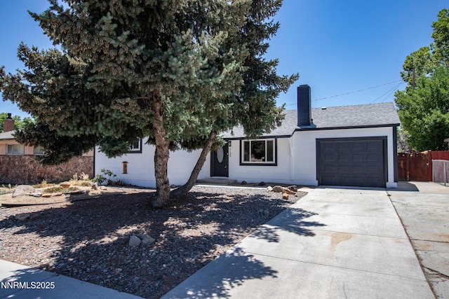 1125 Vance Way, Sparks, NV 89431 - view of front of home with an attached garage, driveway, and roof with shingles