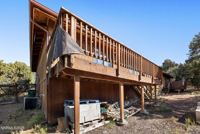 2260 Empire Rd, Reno, NV 89521 - rear view of house featuring a deck and stairway