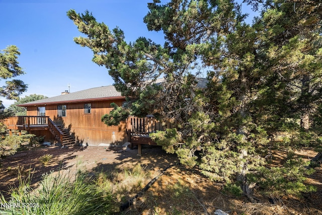 2260 Empire Rd, Reno, NV 89521 - view of yard featuring a wooden deck and stairs