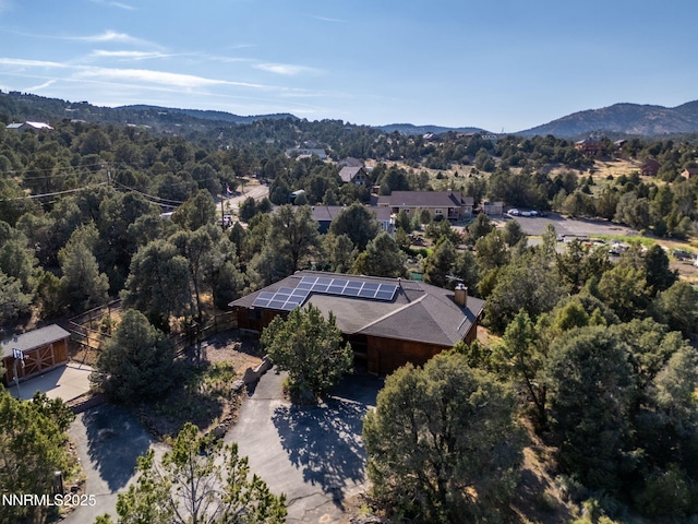 2260 Empire Rd, Reno, NV 89521 - aerial view of property and surrounding area featuring a mountain backdrop and a heavily wooded area