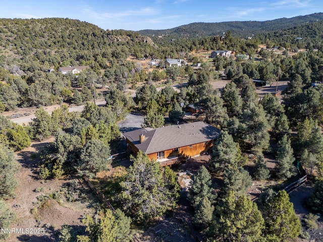 2260 Empire Rd, Reno, NV 89521 - aerial view of property's location featuring a forest and a mountainous background