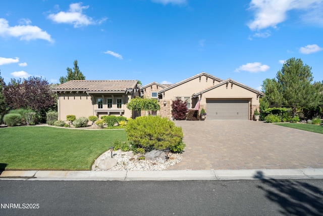 3970 Nature Trl, Reno, NV 89511 - view of front facade featuring stucco siding, a tile roof, an attached garage, decorative driveway, and a front lawn