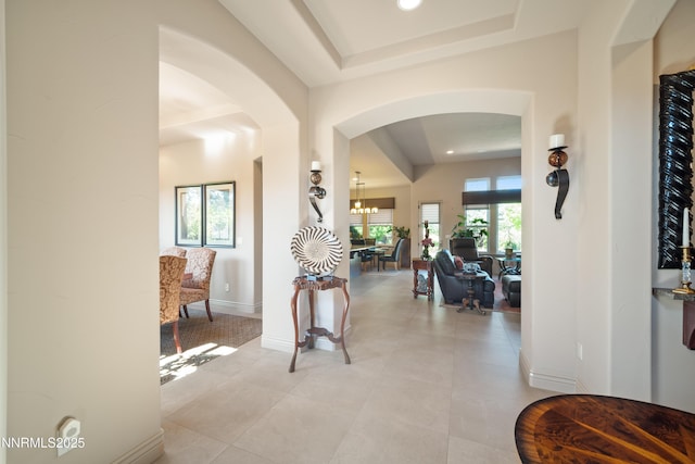 3970 Nature Trl, Reno, NV 89511 - foyer entrance with a raised ceiling, arched walkways, light tile patterned floors, and recessed lighting