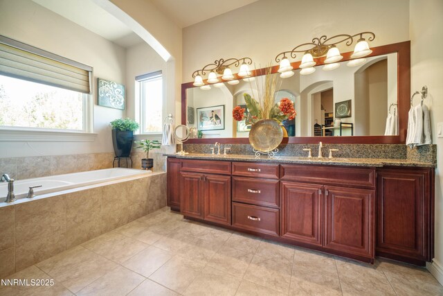 3970 Nature Trl, Reno, NV 89511 - full bath featuring double vanity, a bath, and tile patterned floors