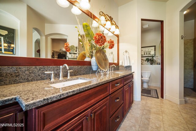 3970 Nature Trl, Reno, NV 89511 - full bathroom featuring double vanity and tile patterned floors