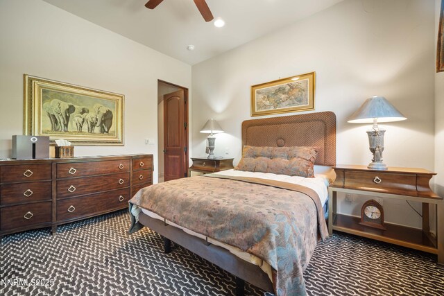 3970 Nature Trl, Reno, NV 89511 - bedroom with dark carpet and a ceiling fan