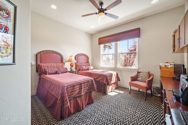 3970 Nature Trl, Reno, NV 89511 - bedroom with dark carpet, recessed lighting, ceiling fan, and a desk