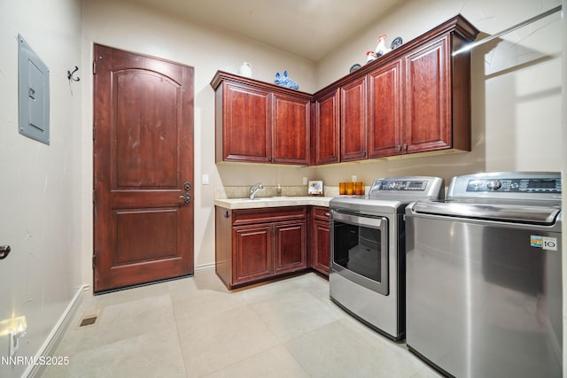 3970 Nature Trl, Reno, NV 89511 - laundry area with electric panel, washing machine and clothes dryer, and cabinet space