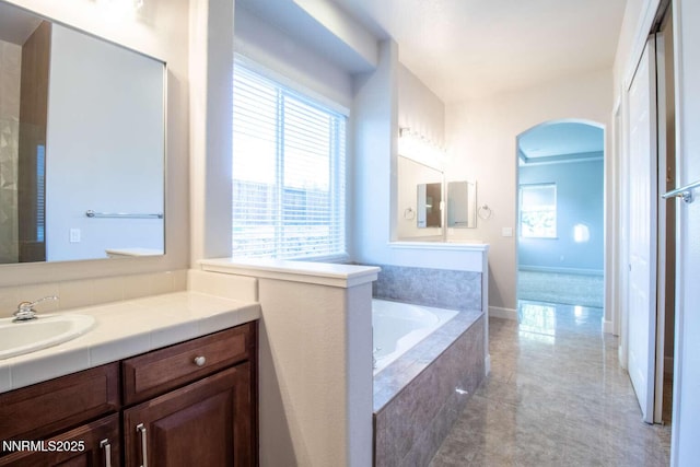 4525 Cobra Dr, Sparks, NV 89436 - full bathroom featuring vanity, a bath, and tile patterned floors