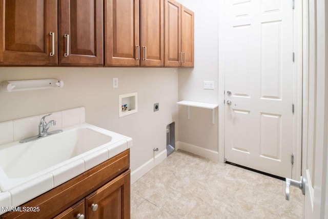 4525 Cobra Dr, Sparks, NV 89436 - laundry area with hookup for an electric dryer, hookup for a gas dryer, washer hookup, and cabinet space